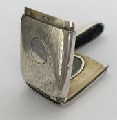 An unusual rare hinged front silver vesta depictin