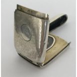 An unusual rare hinged front silver vesta depictin