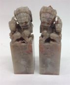 A pair of Chinese hard stone seals in the form of