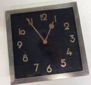 A massive Continental silver Art Deco clock in eng