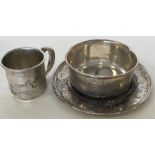 A Continental silver three piece christening set a