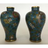 A good pair of Antique cloisonné vases decorated w