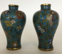 A good pair of Antique cloisonné vases decorated w