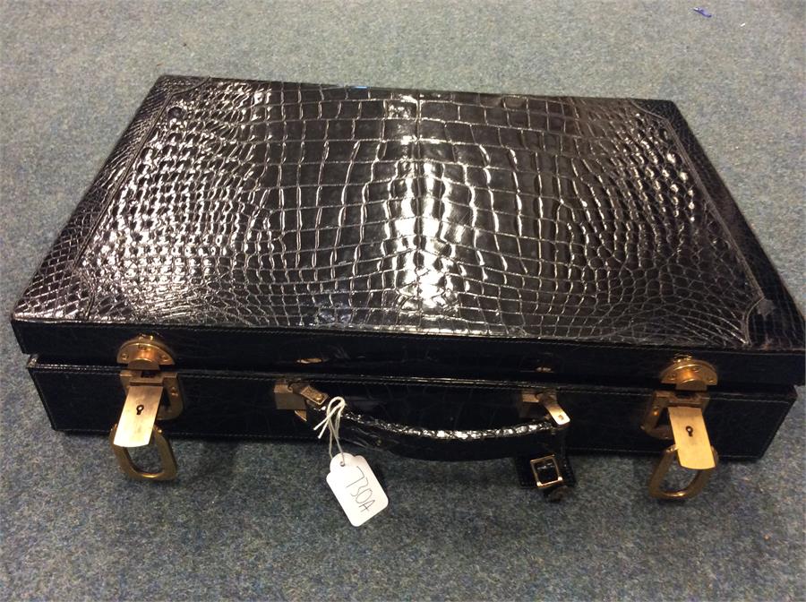 LIBERTY: A good quality crocodile skin briefcase. Est. £600