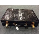 LIBERTY: A good quality crocodile skin briefcase. Est. £600
