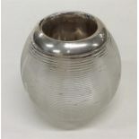 A silver mounted match striker with reeded body. B