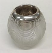 A silver mounted match striker with reeded body. B