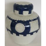 A pottery blue and white oviform vase and cover mo