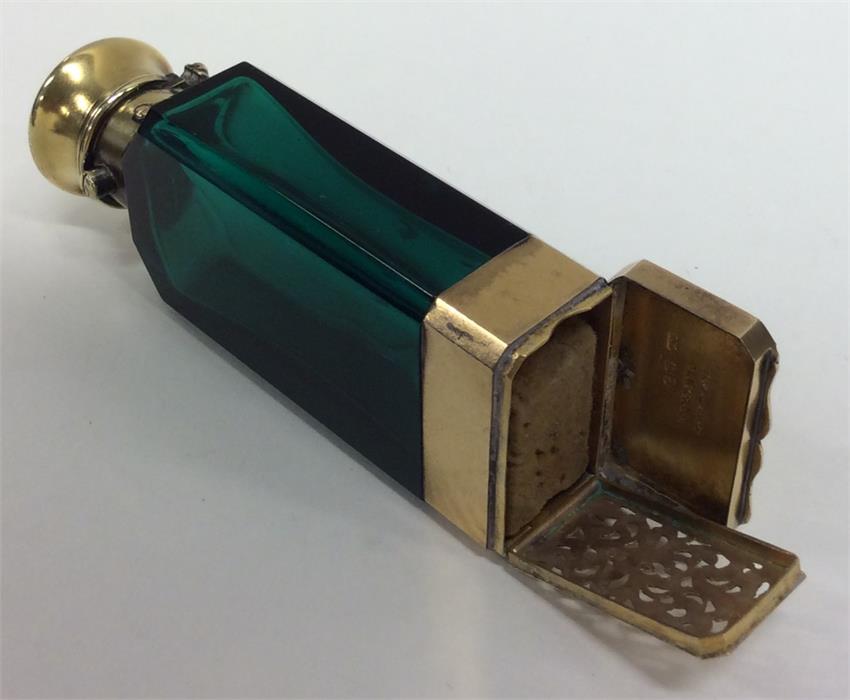 An unusual hinged top silver gilt green scent bott - Image 2 of 3