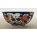 An Imari-style bowl attractively decorated with or