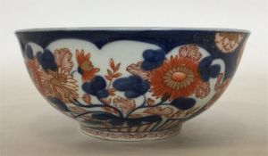 An Imari-style bowl attractively decorated with or