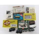 A selection of unboxed rolling stock, to include E