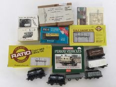 A selection of unboxed rolling stock, to include E