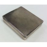 A good quality engine turned silver box with hinged cover