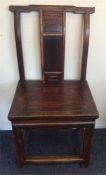 A Chinese hardwood hall chair with stretcher base.