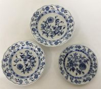 A Meissen blue and white onion pattern shallow dis