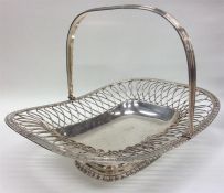 A Georgian-style cake basket with wirework decorat