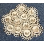 A set of twelve attractively embroidered placemats,
