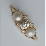 An attractive pearl and diamond seven stone ring i