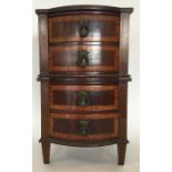 An Edwardian mahogany four drawer chest with strin