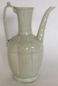 A Chinese Sung porcelain off-white glazed lobed ew