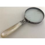 A silver and MOP magnifier. Approx. 133 grams. Est