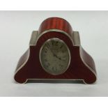 A good quality red enamelled miniature clock with