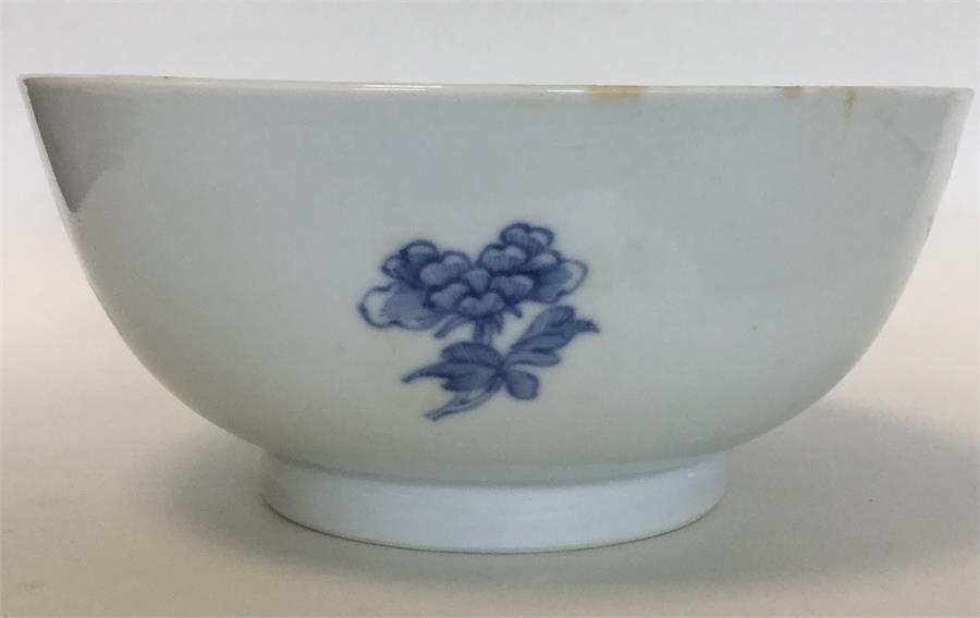 A Chinese porcelain blue and white bowl painted with flowering - Image 3 of 3