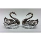 A pair of unusual glass-mounted and silver salts i