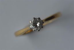 A small 18 carat single stone diamond ring with pl