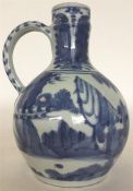 A Japanese porcelain blue and white oviform jug, t