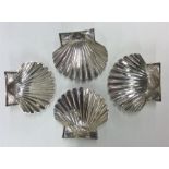 A good set of four Italian silver scallop-shaped s