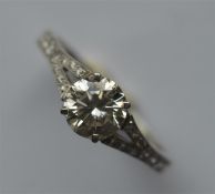 A pleasing diamond single stone ring in four claw