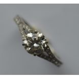 A pleasing diamond single stone ring in four claw