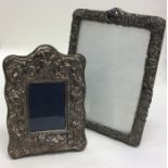 Two silver embossed picture frames. Est. £20 - £30