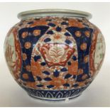 A large Imari-style bowl with floral decoration in