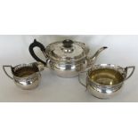 A good quality Edwardian three piece silver tea se