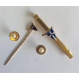A 9 carat Naval tie clip together with matching st