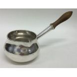 A good quality Georgian silver brandy pan with tur