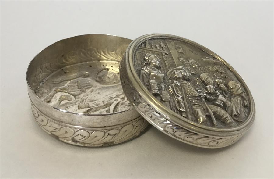 A Continental circular silver gilt pill box depict