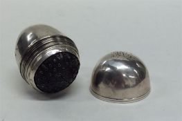 A Georgian silver egg-shaped nutmeg grater fitted