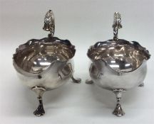 A good pair of miniature silver sauce boats with s