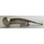 A Victorian bright cut bosun's whistle decorated w