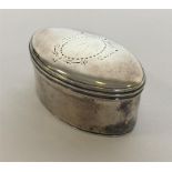 An oval silver nutmeg grater with hinged top, stee