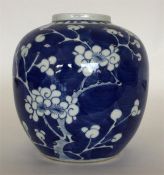 A Chinese blue and white ginger jar painted with p