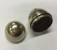 An unusual miniature silver egg-shaped nutmeg grat