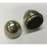 An unusual miniature silver egg-shaped nutmeg grat