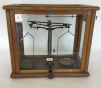 An old mahogany cased chemist scale by W George of