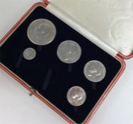 A cased George V silver coin set dated 1927. (One