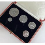 A cased George V silver coin set dated 1927. (One